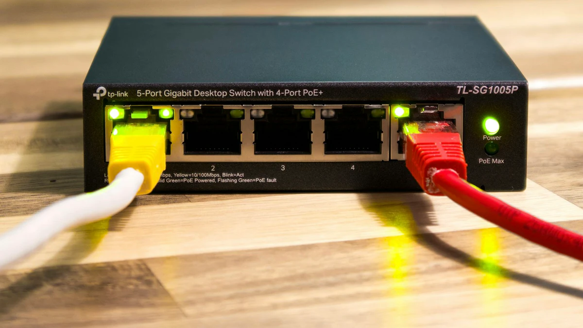 A real desktop network switch with its power and Ethernet connections in place